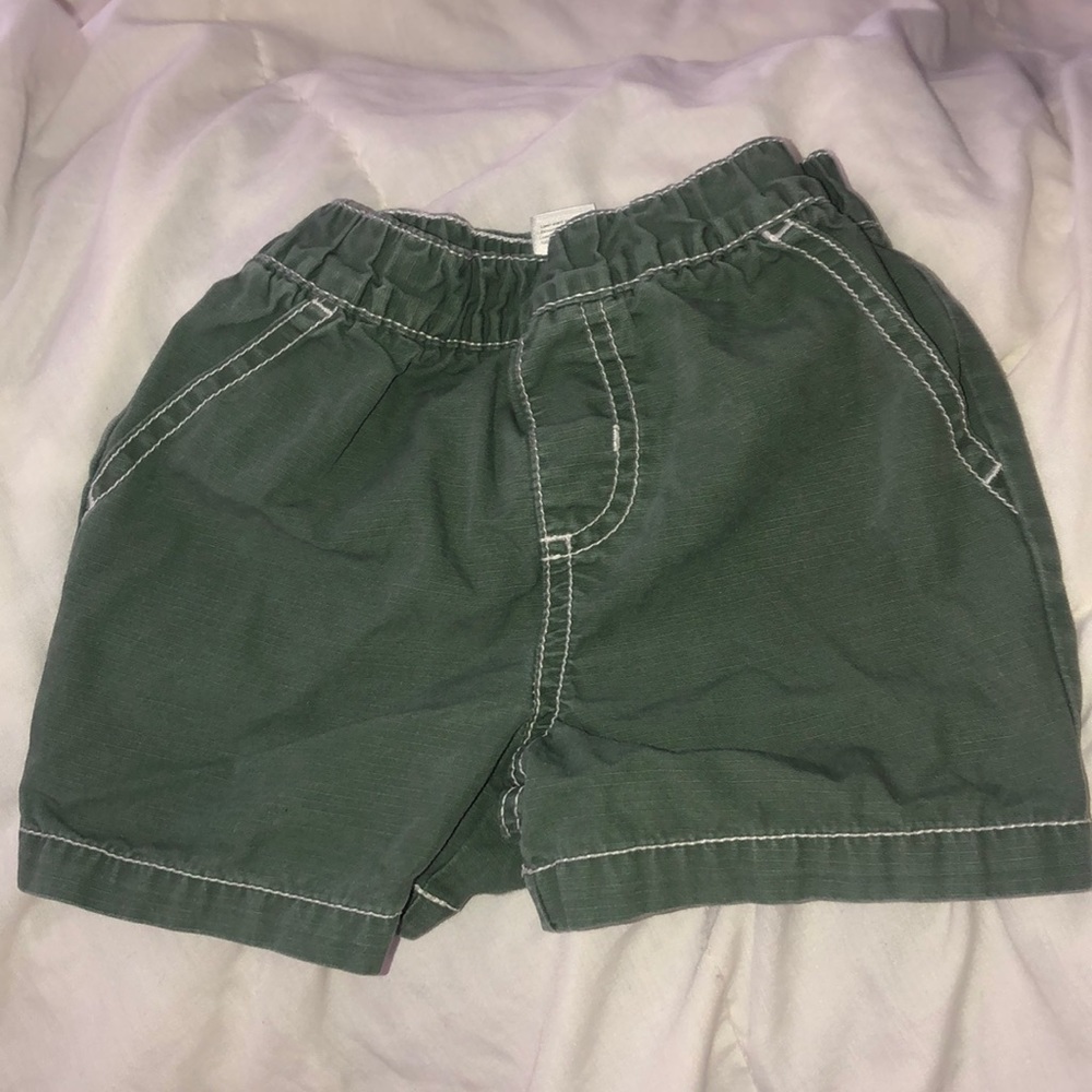 Olive green shorts white stitch